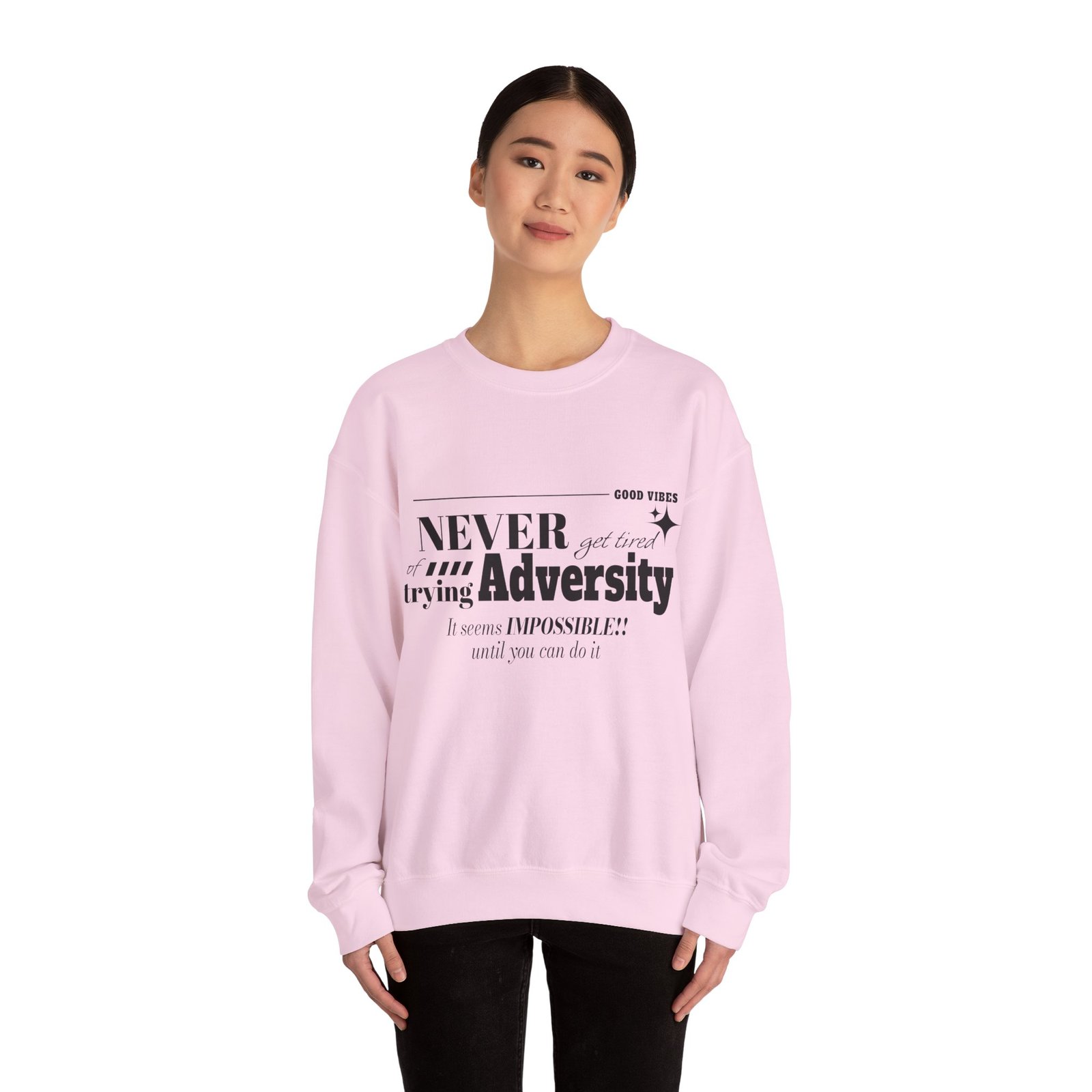 sweatshirt — “never let adversity stop you” inspirational quote